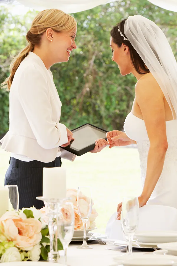 Event planner reviewing details with a client